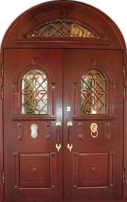 Стальная арочная дверь со стеклом и ковкой ДА-30 в дом из кирпича в Омске