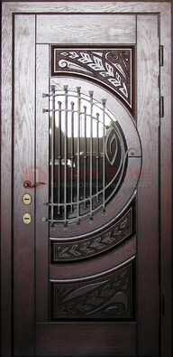Одностворчатая входная дверь со стеклом и ковкой ДСК-21 в Великом Новгороде