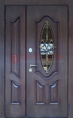 Темная металлическая дверь Винорит со стеклом и ковкой ДСК-239 в Великом Новгороде